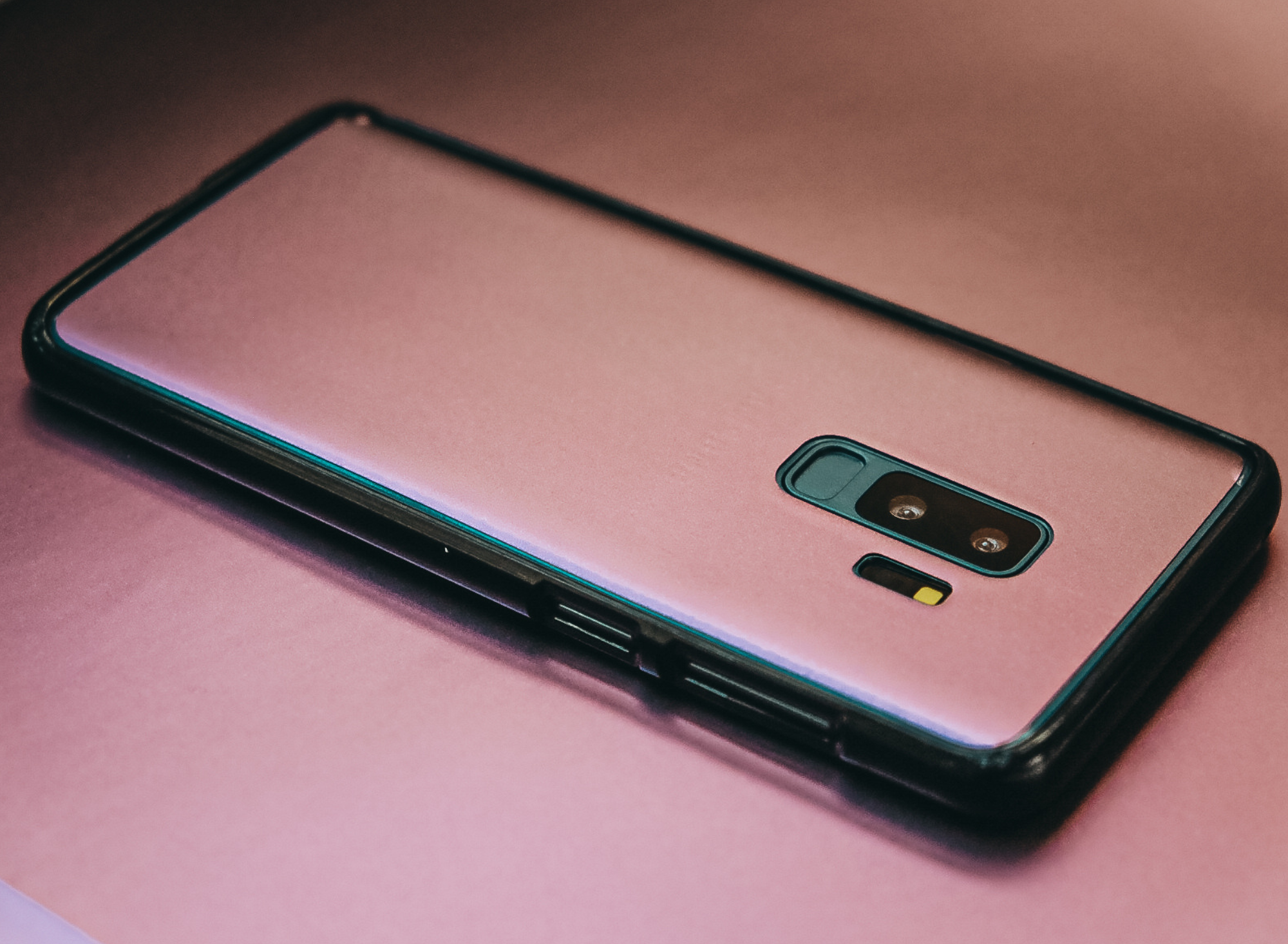 A phone with a vintage pink Style Skins